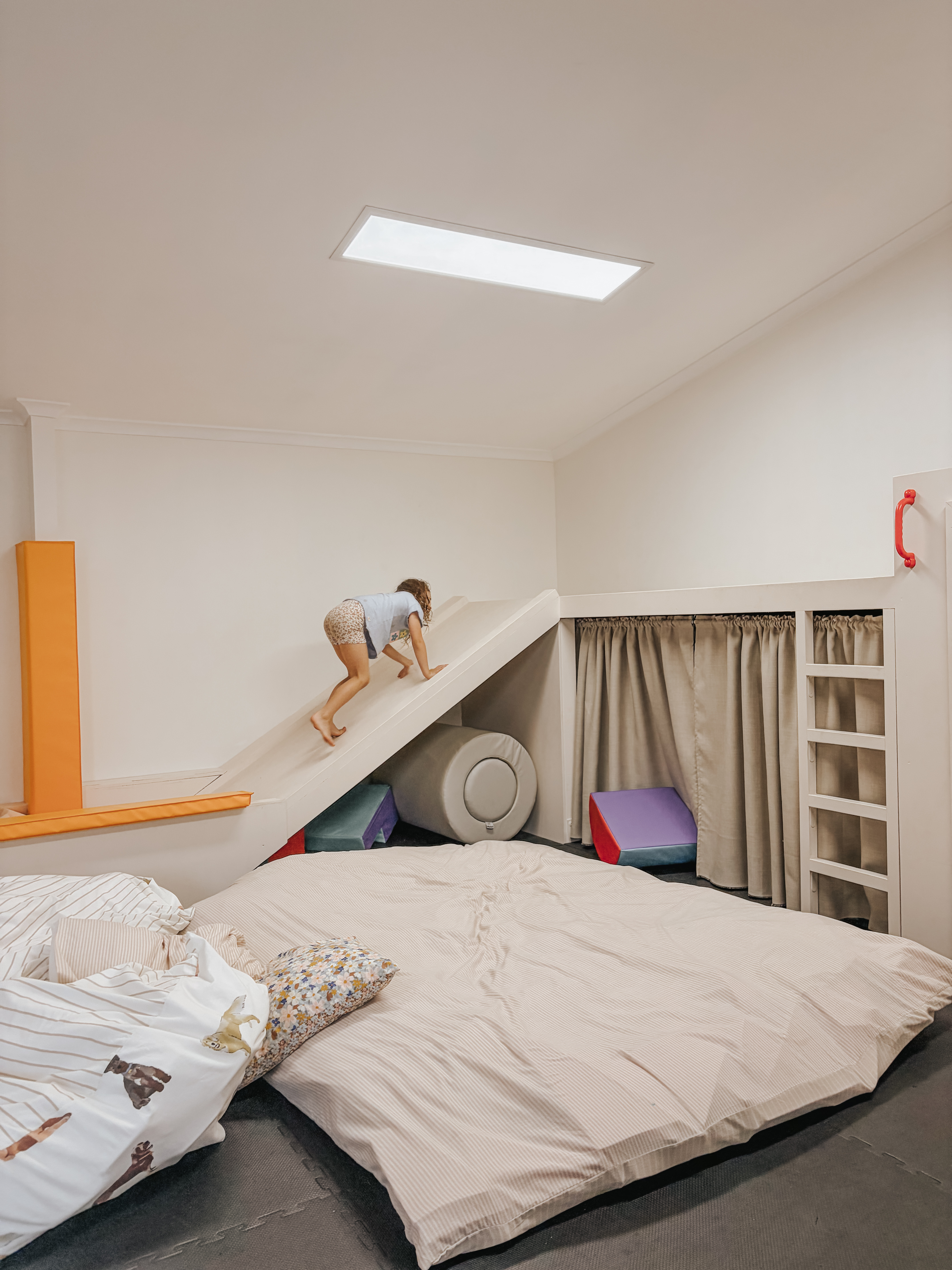 Child climbing in the Bloom studio